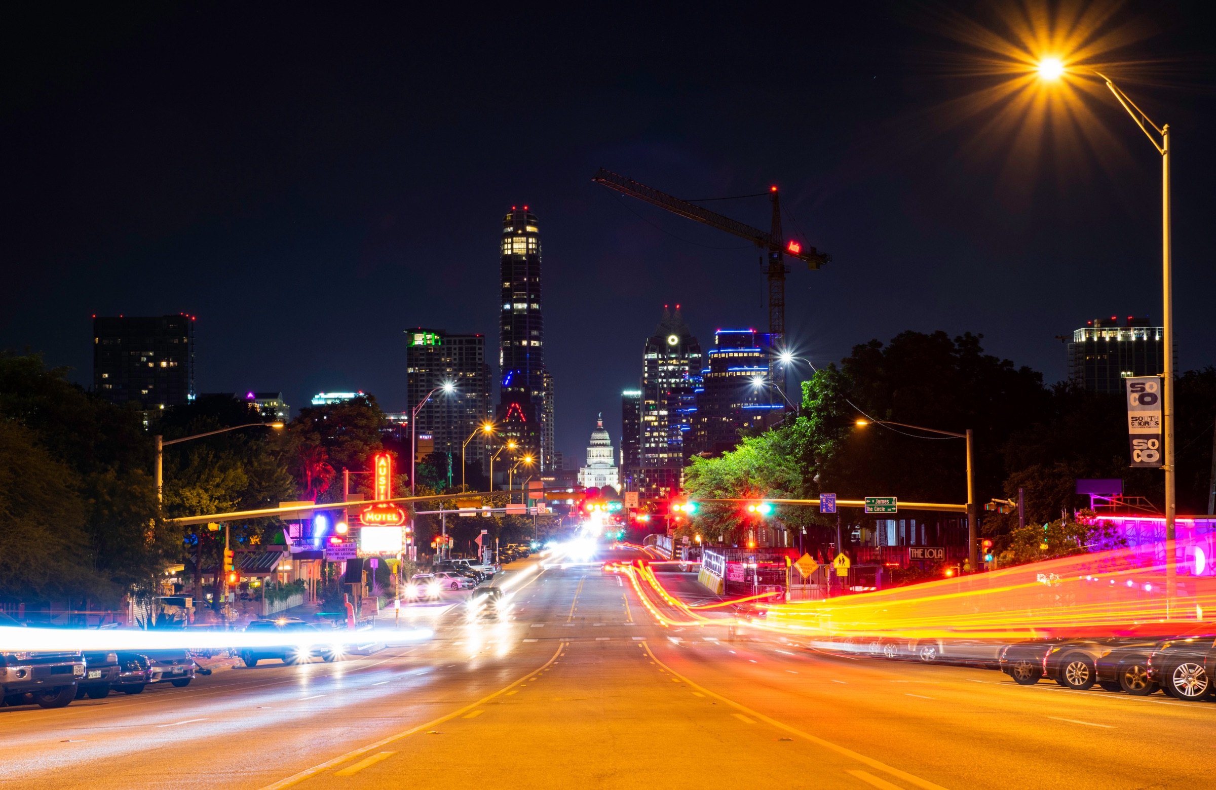 South Congress Avenue in Austin at night, the Texas Capitol at the end of the street